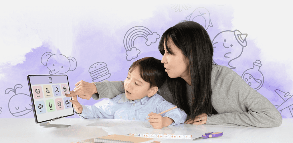 boy with mother drawing on paper